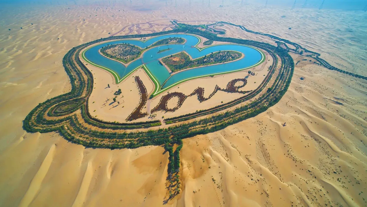 Aerial view of the two heart-shaped lakes at Love Lake Al Qudra