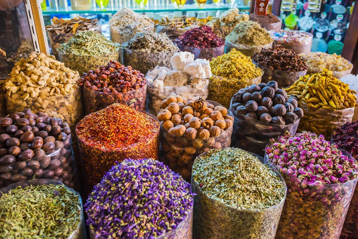 Colourful spices and dried ingredients displayed at Dubai Spice Souk